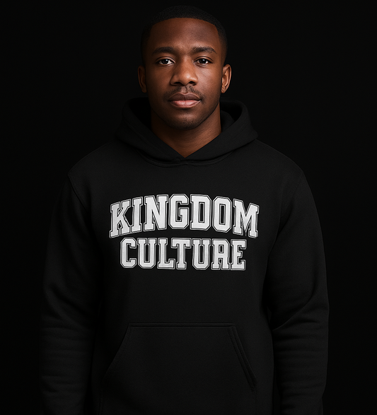 Person wearing a black hoodie with 'Kingdom Culture' text on a black background